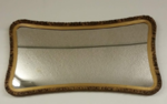 mid-century curved mirror